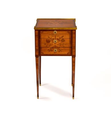 an image of a small wooden table with a drawer on it