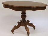 an image of a small table with a wooden top