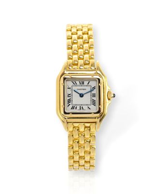 une montre Cartier pour femme, avec un bracelet en or jaune et des chiffres romains