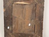 a picture of an old picture frame with a chain hanging from it
