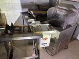 an image of a kitchen with a lot of food in it