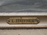 a picture of a sign on a window sill that says i haffner ' s