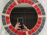 someone taking a picture of themselves in a mirror with a cell phone