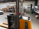 an image of a forklift truck in a warehouse