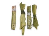 three umbrellas that have been wrapped up and tied together