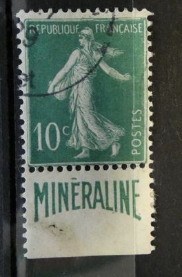 an old stamp with a picture of a woman on it