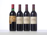 three bottles of wine are lined up on a table