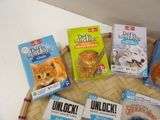 several children ' s books on a wicker basket on a table