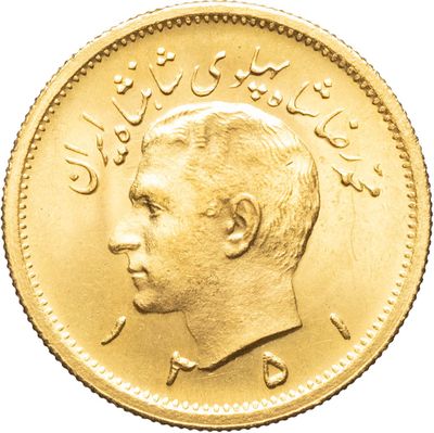 gros plan d'une pièce d'or avec le visage d'un homme