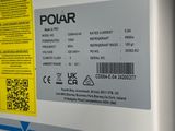 a white refrigerator with a yellow sticker on it
