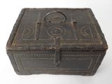an old wooden box with a handle on it