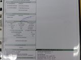 une photo d'un ticket de caisse dans un sac en plastique posé sur une table