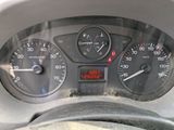 a close up of a car dashboard with a speedometer