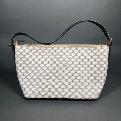 a white and black purse with a black handle