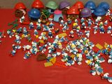 a red table with a bunch of legos on it