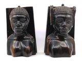 pair of african carved bookends of a woman and a man