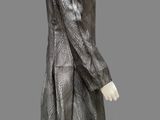 an image of a mannequin dressed in a black and white dress