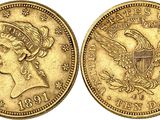 une pièce d'or sur laquelle figurent le portrait d'une femme et un aigle