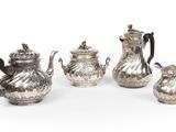 un ensemble composé de quatre théières en argent et d'une cafetière