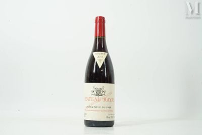 a bottle of wine that is sitting on a table