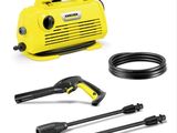 a close up of a yellow pressurer and hose on a white background
