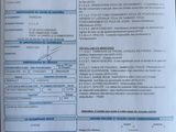 a sheet of paper with information on it sitting on a table