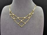un collier en or et diamants sur un mannequin, un mannequin, un mannequin, un mannequin, un mannequin, un mannequin, un mannequin, un mannequin, un mannequin, un mannequin, un mannequin, un mannequin, un mannequin, un mannequin, un mannequin, un mannequin, un mannequin, un mannequin, un mannequin, un mannequin, un mannequin, un mannequin, un mannequin, un mannequin, un mannequin, un mannequin, un mannequin, un mannequin, un mannequin, un mannequin, un mannequin, un mannequin, un mannequin
