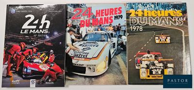 three racing books on a table with a number of racing cars