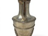 an image of a silver vase on a stand on a white background