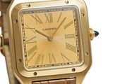 an image of a gold watch with roman numerals on the face