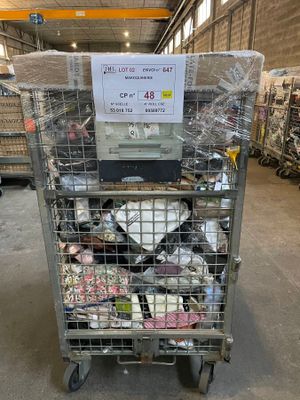 a metal cart with a lot of items in it