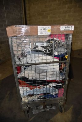 a cart with a lot of clothes on top of it