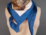 an image of a mannequin torso with a scarf on it