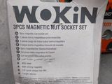 a box of wokin on the ground next to a box of nuts