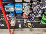 a display of many different types of electronics in a store