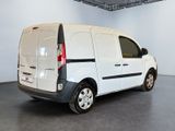 a picture of a white van parked in a garage