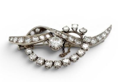 an antique diamond broochle, by van cleef