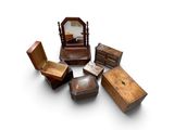 plusieurs morceaux de bois sont disposés en cercle sur une surface blanche