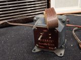 a small electric device that is sitting on the floor