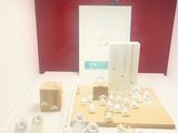 a display of jewelry on display in a glass case