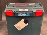a trash can that has a tag on it