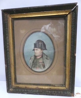 an old picture of a man in a military uniform in a picture frame