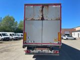 a truck that has rust on the back of it