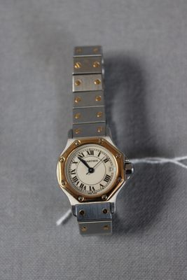 CARTIER bracelet montre dame, modèle Santos or et acier, 187…