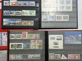 several different types of stamps on display in a display case