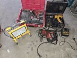 many tools that are sitting on the floor next to each other