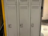 two lockers that are in a room with a yellow wall