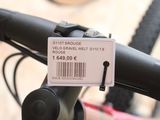 a label on the handlebar of a bicycle with a barcode