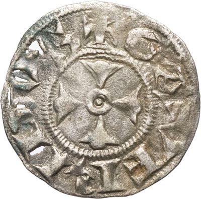 gros plan d'une pièce de monnaie sur fond blanc