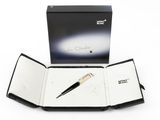 a pen in a box with a pen in it